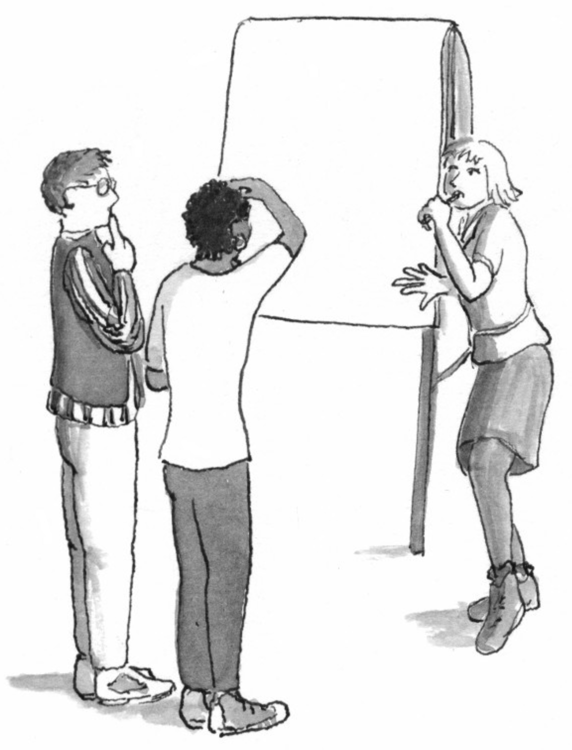 Three people working together at a flipchart, planning activities